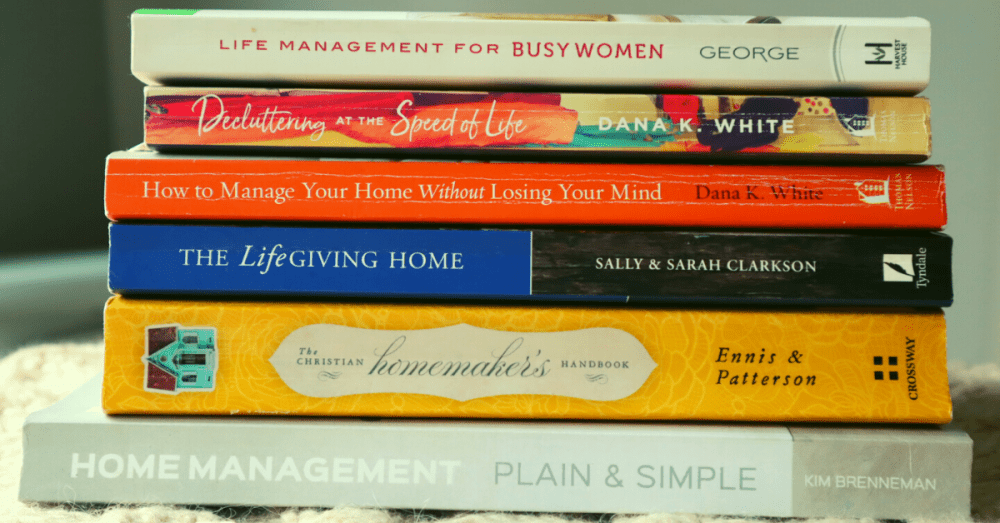 stack of books on a blanket