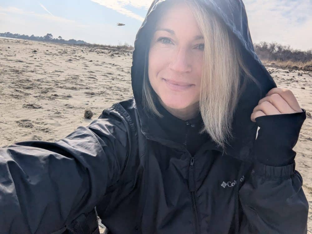 Noel being rebelliously unbothered on the beach